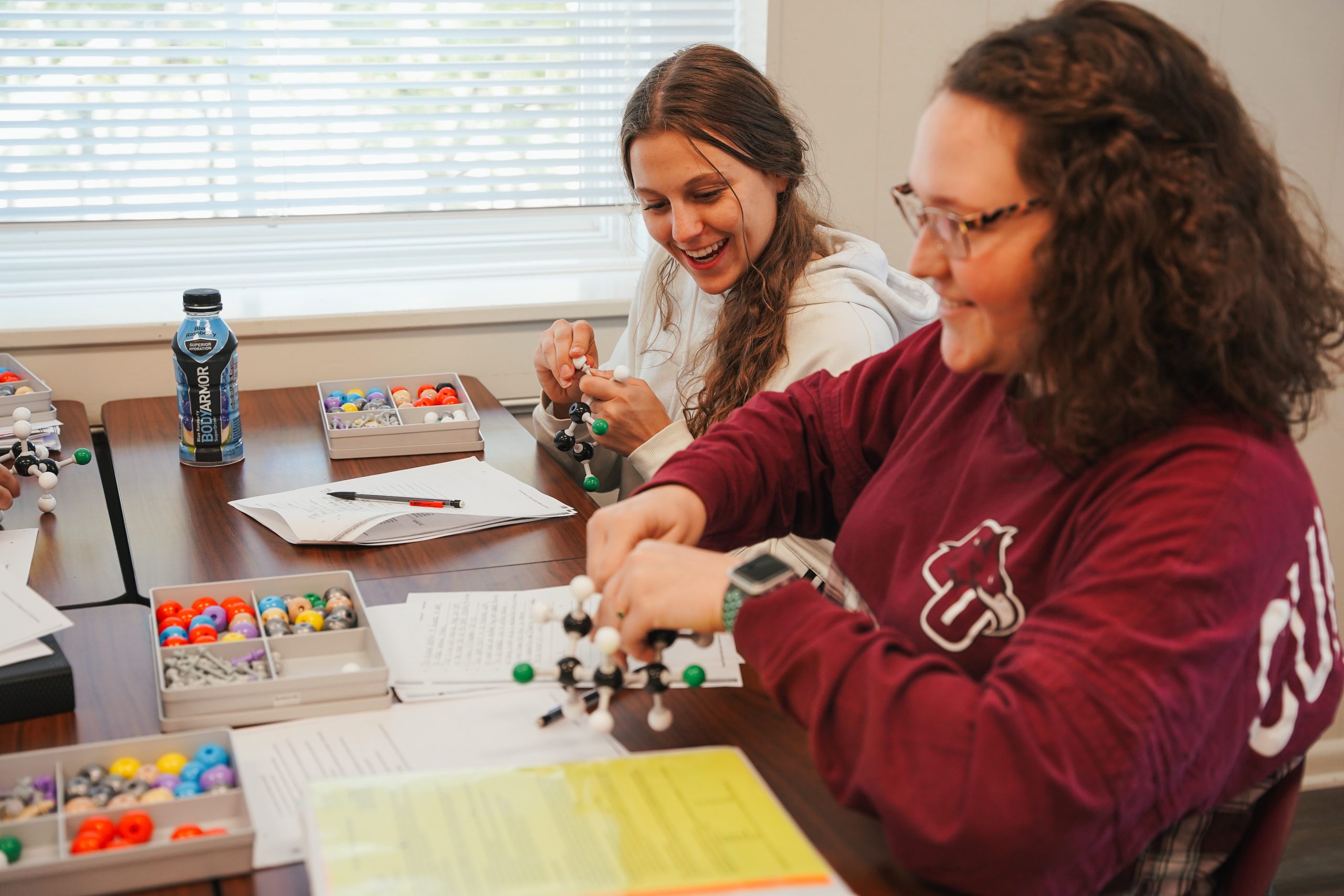 Students building molecular models